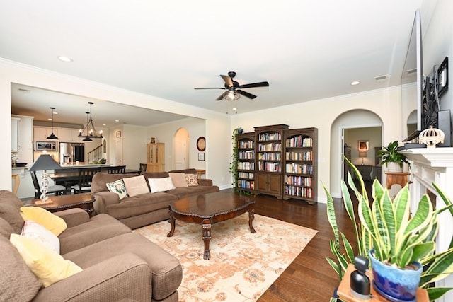 146 Monarchos Dr, Gallatin, TN 37066 - living area with arched walkways, dark wood finished floors, a ceiling fan, baseboards, and recessed lighting