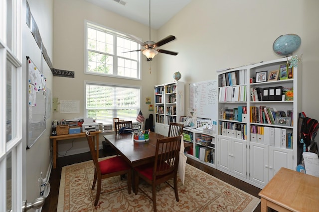 146 Monarchos Dr, Gallatin, TN 37066 - dining space featuring a towering ceiling, wood finished floors, a desk, and a ceiling fan