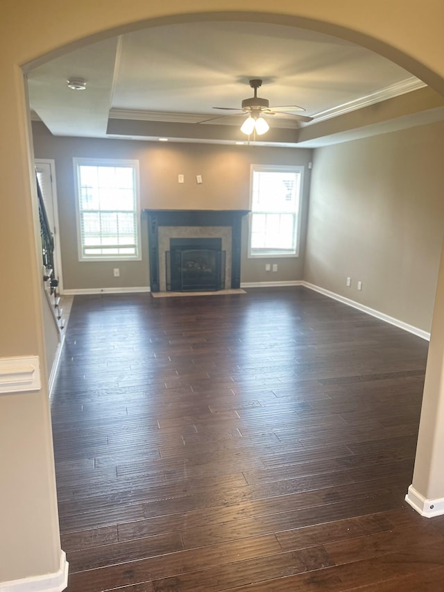 1370 Millet Dr, Clarksville, TN 37040 - unfurnished living room featuring crown molding, a tray ceiling, plenty of natural light, and ceiling fan