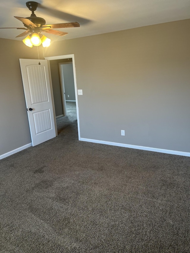 1370 Millet Dr, Clarksville, TN 37040 - unfurnished room featuring ceiling fan, dark carpet, and baseboards