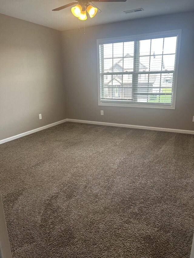 1370 Millet Dr, Clarksville, TN 37040 - carpeted spare room featuring baseboards, healthy amount of natural light, and ceiling fan