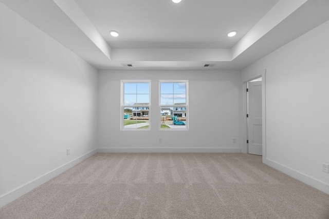 2436T Hamilton Ln, Lebanon, TN 37087 - spare room featuring a tray ceiling, light colored carpet, baseboards, and recessed lighting