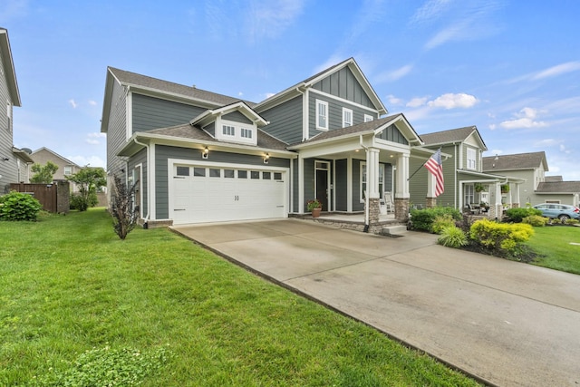 3368 Vinemont Dr, Thompsons Station, TN 37179 - craftsman-style house featuring a porch, board and batten siding, concrete driveway, and an attached garage