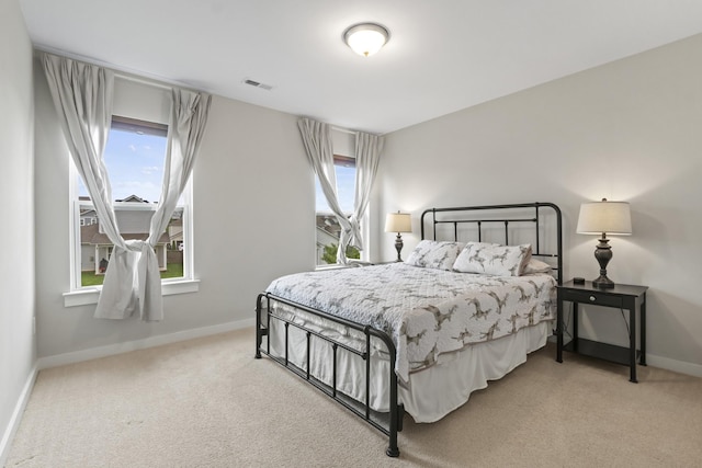3368 Vinemont Dr, Thompsons Station, TN 37179 - bedroom featuring carpet flooring, multiple windows, and baseboards