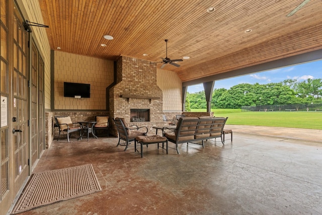 3368 Vinemont Dr, Thompsons Station, TN 37179 - view of patio / terrace with an outdoor living space with a fireplace and a ceiling fan