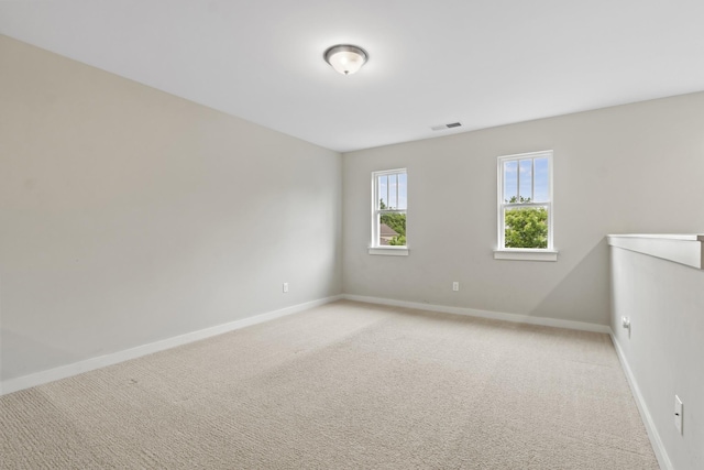 3368 Vinemont Dr, Thompsons Station, TN 37179 - spare room featuring light colored carpet and baseboards