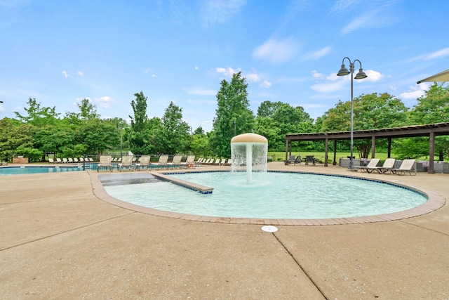 3368 Vinemont Dr, Thompsons Station, TN 37179 - community pool featuring a patio and view of scattered trees