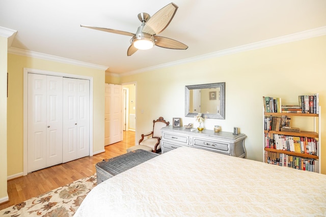 1234 Windsor Dr, Gallatin, TN 37066 - bedroom featuring ornamental molding, light wood-style flooring, a closet, baseboards, and a ceiling fan
