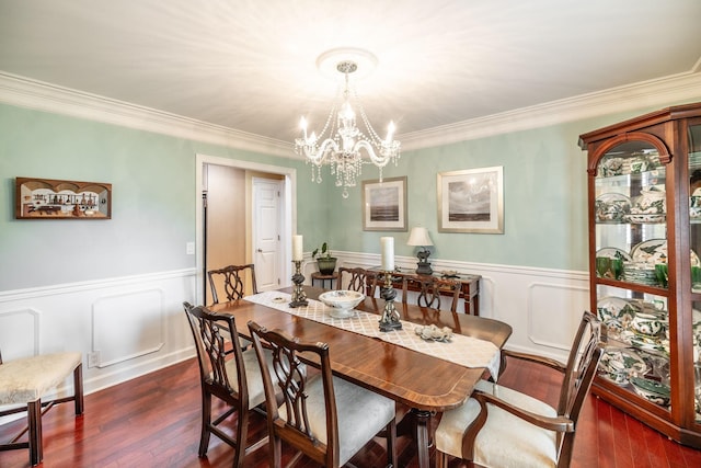 1234 Windsor Dr, Gallatin, TN 37066 - dining area with wainscoting, ornamental molding, a chandelier, dark wood-style floors, and a decorative wall