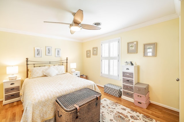 1234 Windsor Dr, Gallatin, TN 37066 - bedroom featuring crown molding, light wood finished floors, baseboards, and a ceiling fan