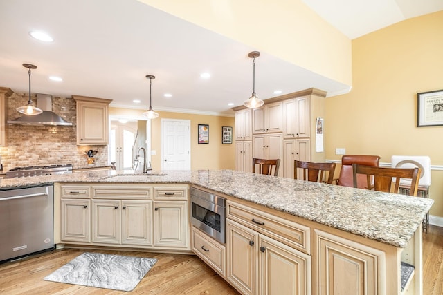 1234 Windsor Dr, Gallatin, TN 37066 - kitchen with a sink, appliances with stainless steel finishes, wall chimney range hood, light wood finished floors, and ornamental molding