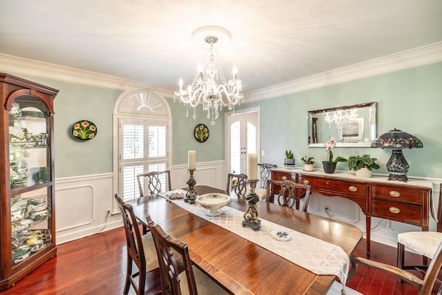 1234 Windsor Dr, Gallatin, TN 37066 - dining room with plenty of natural light, dark wood-style floors, arched walkways, ornamental molding, and a wainscoted wall