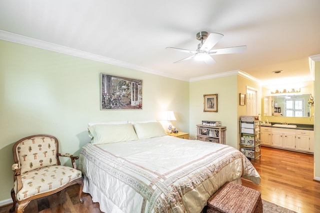 1234 Windsor Dr, Gallatin, TN 37066 - bedroom featuring crown molding, light wood-style floors, ensuite bath, a sink, and a ceiling fan