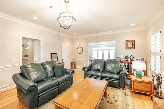 1234 Windsor Dr, Gallatin, TN 37066 - living area featuring ornamental molding, plenty of natural light, light wood-style flooring, a wainscoted wall, and recessed lighting
