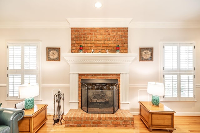 1234 Windsor Dr, Gallatin, TN 37066 - living area with crown molding, wood finished floors, a fireplace, and baseboards