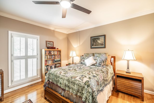 1234 Windsor Dr, Gallatin, TN 37066 - bedroom featuring crown molding, light wood-type flooring, baseboards, and a ceiling fan