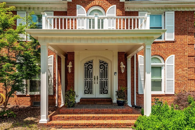1234 Windsor Dr, Gallatin, TN 37066 - entrance to property featuring a balcony and brick siding