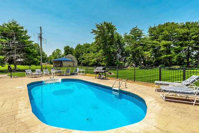 1234 Windsor Dr, Gallatin, TN 37066 - view of swimming pool featuring a patio, a gazebo, view of scattered trees, and area for grilling