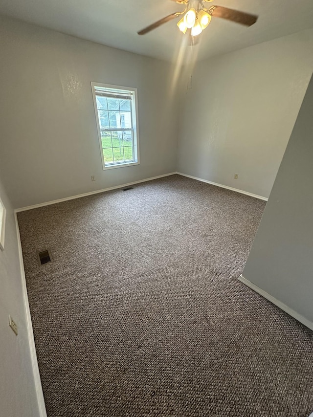 130 Post Oak Ave, Camden, TN 38320 - spare room with carpet, ceiling fan, and baseboards