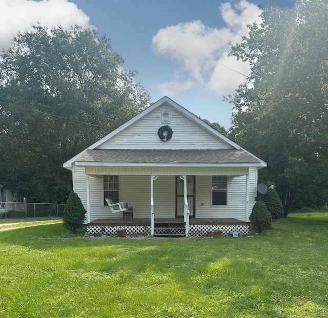 130 Post Oak Ave, Camden, TN 38320 - view of front of house featuring roof with shingles and covered porch