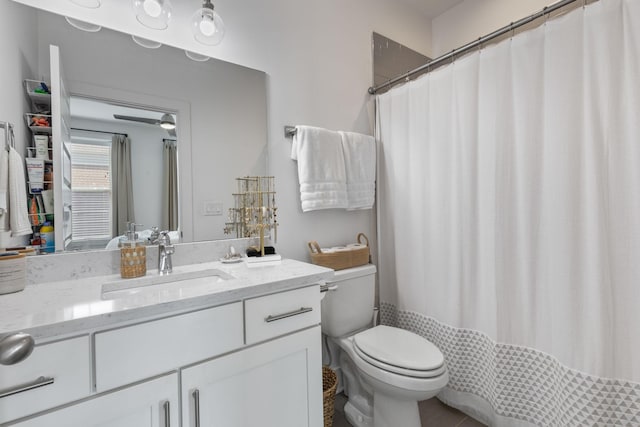 682 James Ave, Nashville, TN 37209 - bathroom with vanity, toilet, and a shower with shower curtain