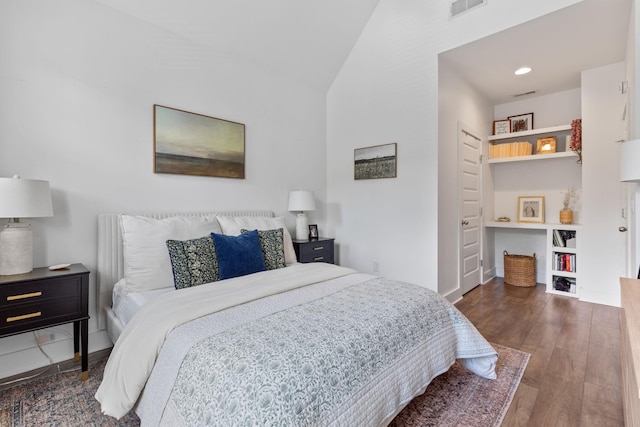 682 James Ave, Nashville, TN 37209 - bedroom with wood finished floors, vaulted ceiling, baseboards, and recessed lighting