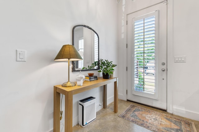 682 James Ave, Nashville, TN 37209 - foyer with finished concrete floors and baseboards