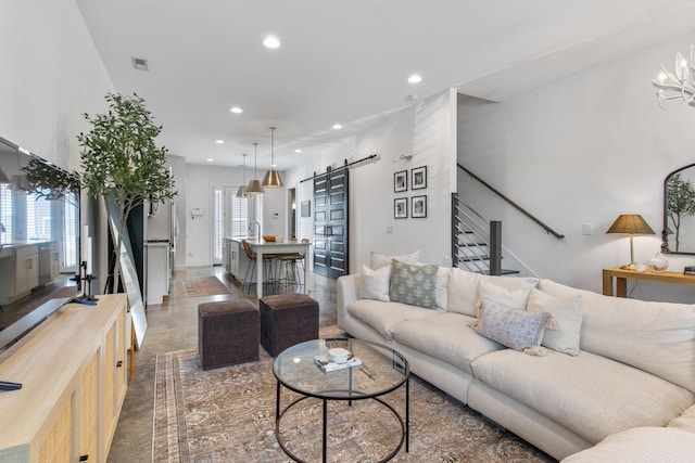 682 James Ave, Nashville, TN 37209 - living area featuring a barn door, recessed lighting, and stairway