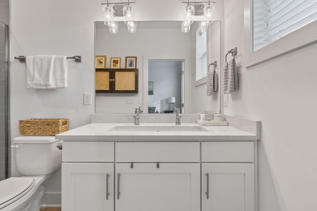 682 James Ave, Nashville, TN 37209 - full bath featuring toilet, vanity, and a tile shower