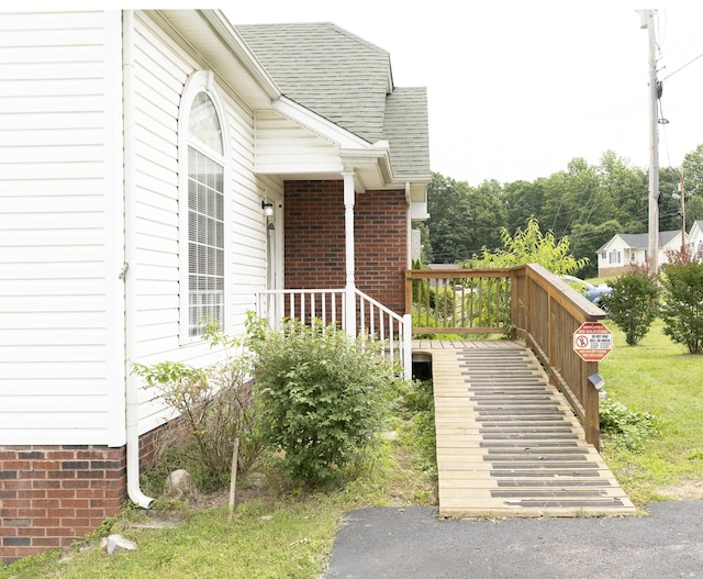 1036 Woodbrier Ln, Greenbrier, TN 37073 - view of side of home featuring roof with shingles, a deck, and stairway