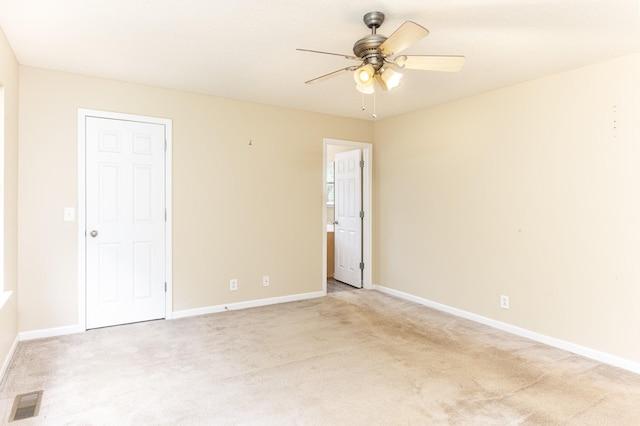 1036 Woodbrier Ln, Greenbrier, TN 37073 - unfurnished bedroom featuring light colored carpet, baseboards, and a ceiling fan