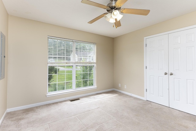 1036 Woodbrier Ln, Greenbrier, TN 37073 - unfurnished bedroom with multiple windows, carpet flooring, and baseboards