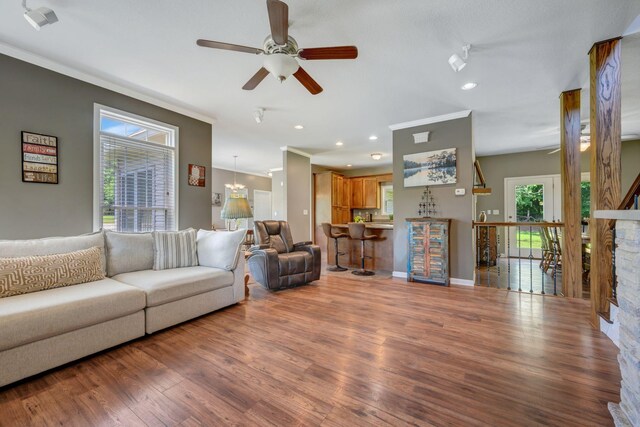 80 Latimer Cemetery Ln, Waverly, TN 37185 - living area with ceiling fan, wood finished floors, crown molding, recessed lighting, and baseboards