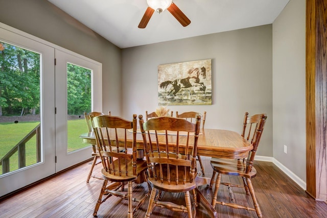 80 Latimer Cemetery Ln, Waverly, TN 37185 - dining room with wood-type flooring, a ceiling fan, and baseboards