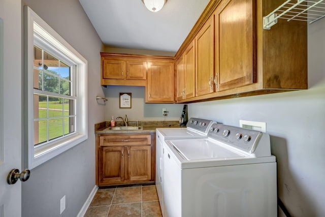 80 Latimer Cemetery Ln, Waverly, TN 37185 - washroom with cabinet space, washing machine and clothes dryer, baseboards, and light tile patterned flooring