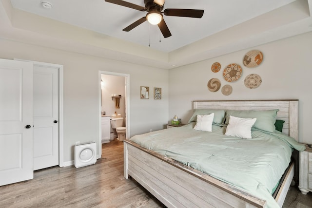 611 Annas Way, Lewisburg, TN 37091 - bedroom with light wood-style floors, ensuite bathroom, ceiling fan, and baseboards