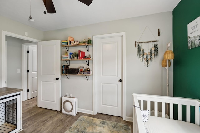 611 Annas Way, Lewisburg, TN 37091 - bedroom featuring wood finished floors, baseboards, a crib, and a ceiling fan
