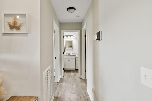 611 Annas Way, Lewisburg, TN 37091 - hall with light wood-style flooring and baseboards