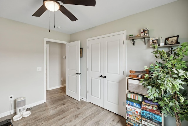 611 Annas Way, Lewisburg, TN 37091 - bedroom with light wood-style floors, a closet, a ceiling fan, and baseboards