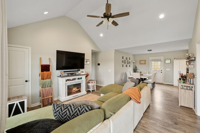 611 Annas Way, Lewisburg, TN 37091 - living room featuring ceiling fan, wood finished floors, baseboards, recessed lighting, and a warm lit fireplace