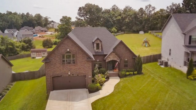 1230 Ridge Meadow Dr, Clarksville, TN 37042 - view of front of home featuring brick siding, concrete driveway, and a garage