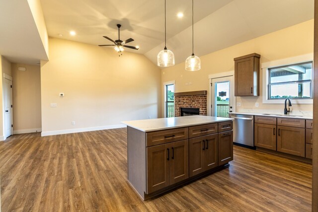 5359 Roy Holman Rd, Springfield, TN 37172 - kitchen with dishwasher, open floor plan, a sink, dark wood-style floors, and vaulted ceiling
