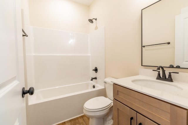 5359 Roy Holman Rd, Springfield, TN 37172 - bathroom with toilet, vanity, bathing tub / shower combination, and wood finished floors