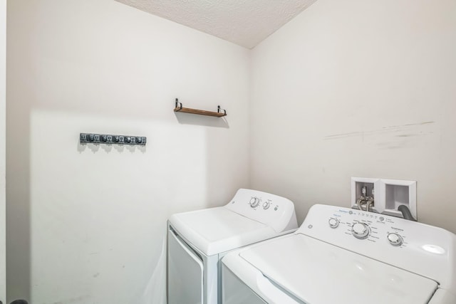 1435 Silver Creek Rd, Lewisburg, TN 37091 - washroom with washer and dryer and a textured ceiling