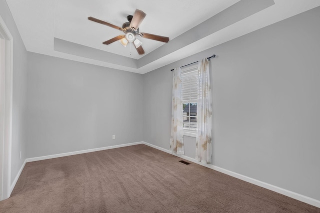 1435 Silver Creek Rd, Lewisburg, TN 37091 - carpeted empty room featuring ceiling fan, a raised ceiling, and baseboards