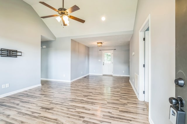 1435 Silver Creek Rd, Lewisburg, TN 37091 - spare room with wood finished floors, baseboards, a ceiling fan, and high vaulted ceiling