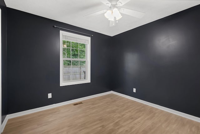 1435 Silver Creek Rd, Lewisburg, TN 37091 - spare room with wood finished floors, a ceiling fan, and baseboards