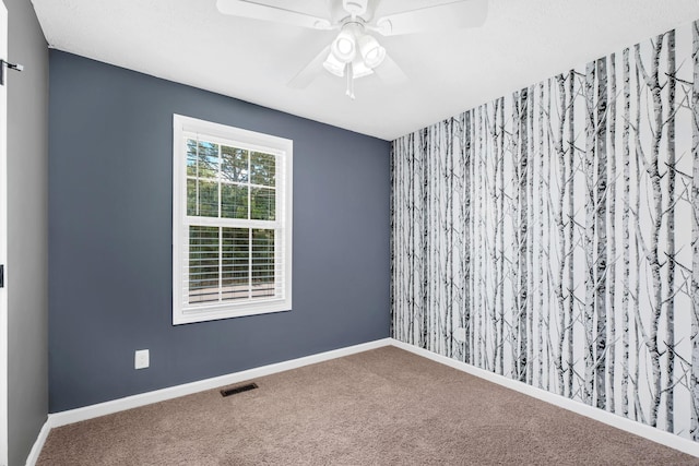 1435 Silver Creek Rd, Lewisburg, TN 37091 - empty room featuring carpet floors, a ceiling fan, and baseboards