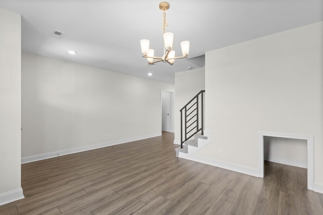 231 Donegal Dr, Clarksville, TN 37042 - spare room featuring a chandelier, dark wood-type flooring, stairway, recessed lighting, and baseboards