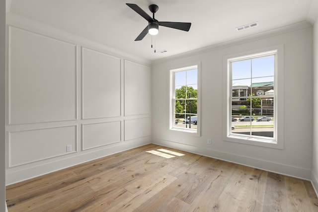 1701 Portland Ave Unit C, Nashville, TN 37212 - spare room with ornamental molding, light wood-style flooring, a ceiling fan, and baseboards